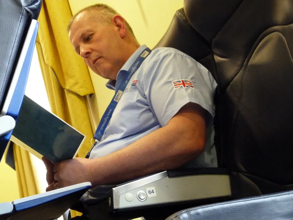 Fight Medic Nick Ginnever onboard a flight